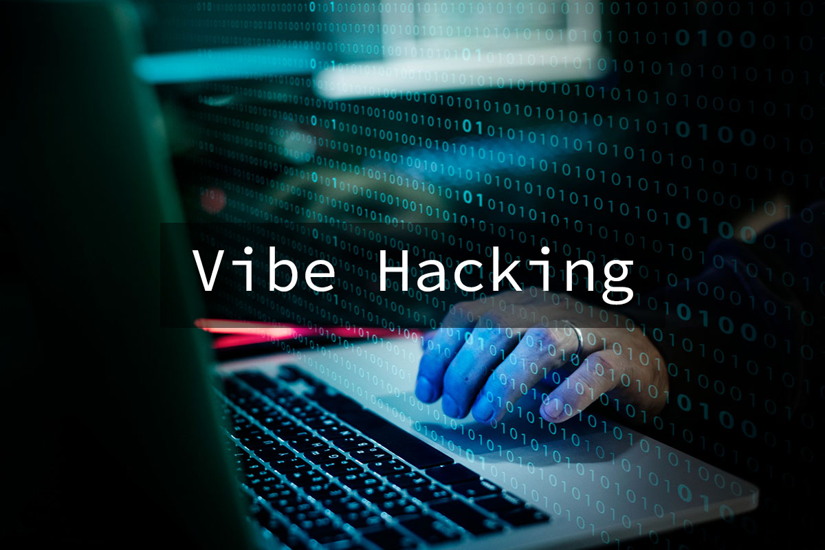 Vibe hacking concept with binary code and a person typing on a laptop.