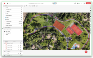 Robotic arms in a warehouse applying 2D image annotation with bounding boxes around packages